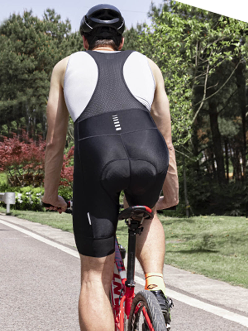 Back view of black cycling bib shorts with padded seat and leg panels