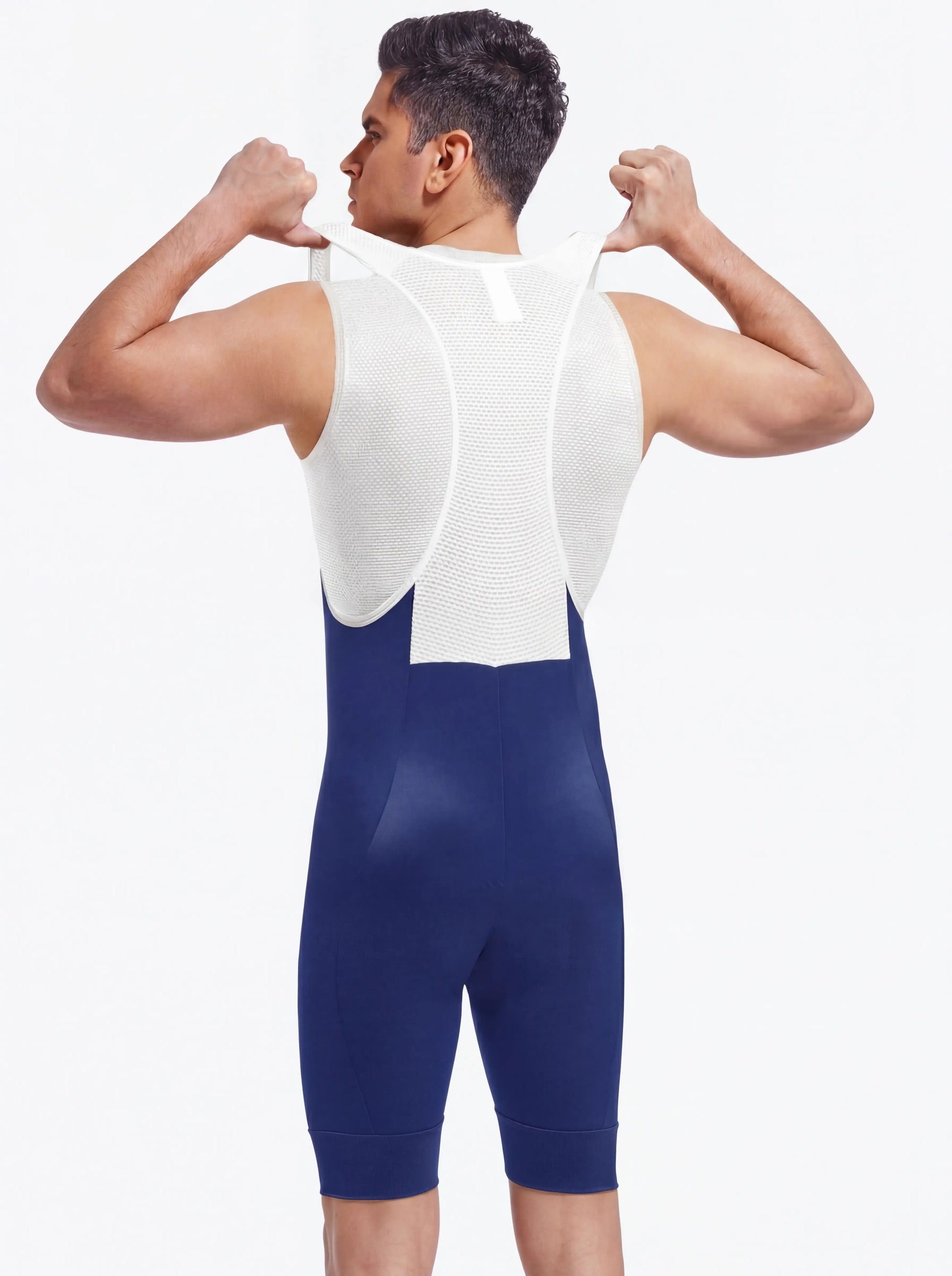 QUALICOS Men's Cycling Bib Shorts blue back view on model with white breathable mesh bib straps
