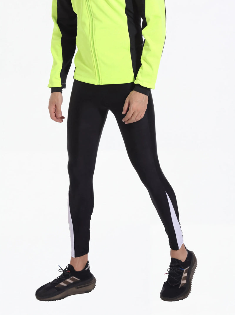 QUALICOS Men's Lightweight Cycling Tights black angled view on model with reflective ankle panel and slim fit