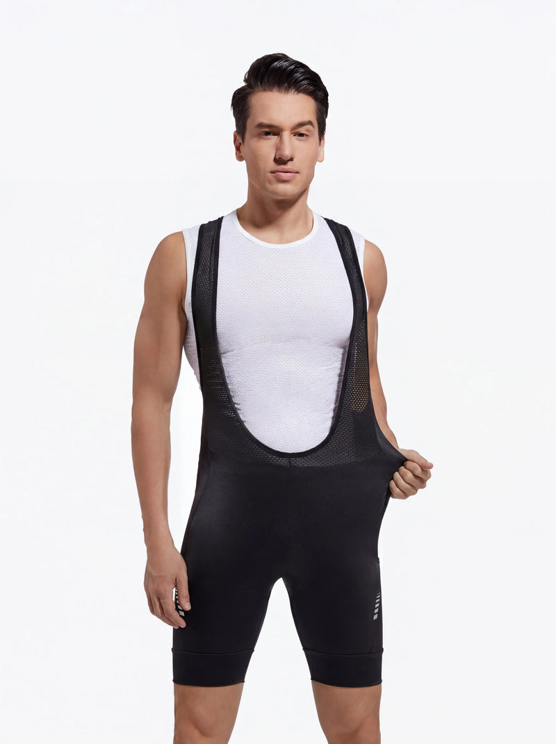 QUALICOS Men's MTB Performance Bib Shorts black front view on model with breathable mesh bib straps and stretch fit