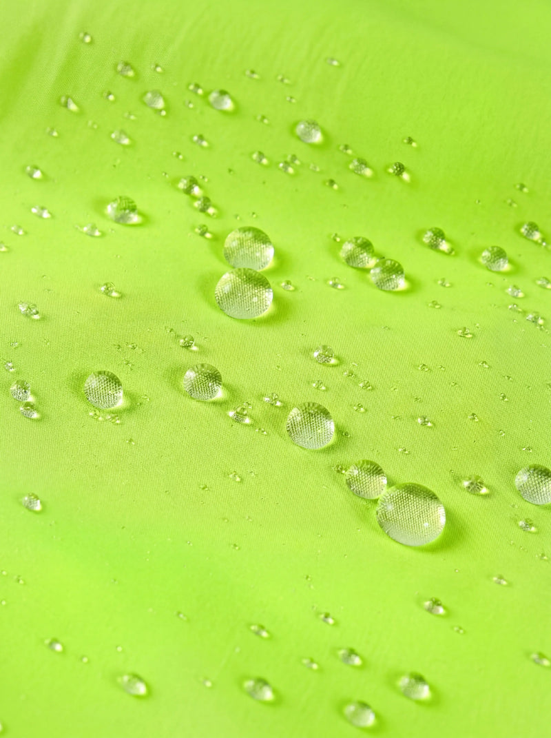QUALICOS Men's Windproof Cycling Vest high-vis yellow water-repellent fabric close-up with beaded droplets