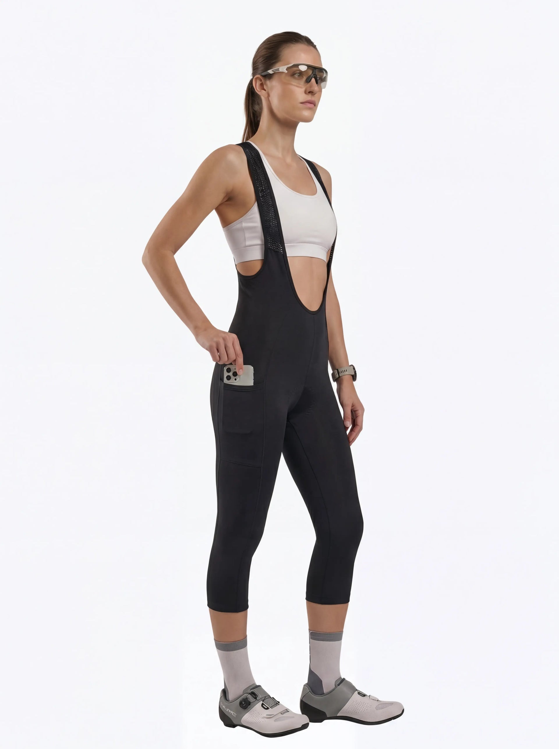 QUALICOS Women's 3/4 Cycling Bib Shorts with Pockets black bib capri on model with side phone pocket
