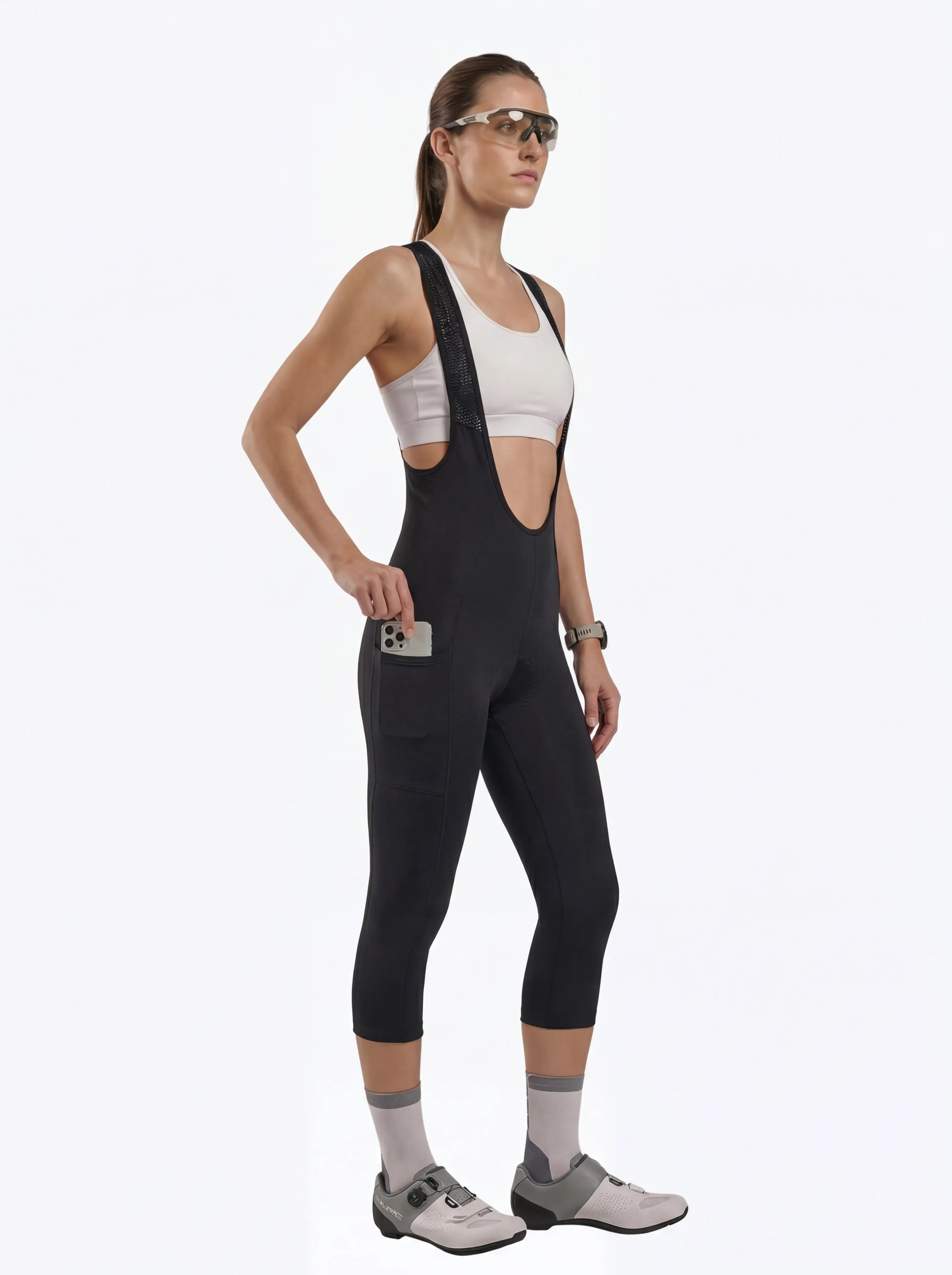 QUALICOS Women's 3/4 Cycling Bib Shorts with Pockets black bib capri on model with side phone pocket