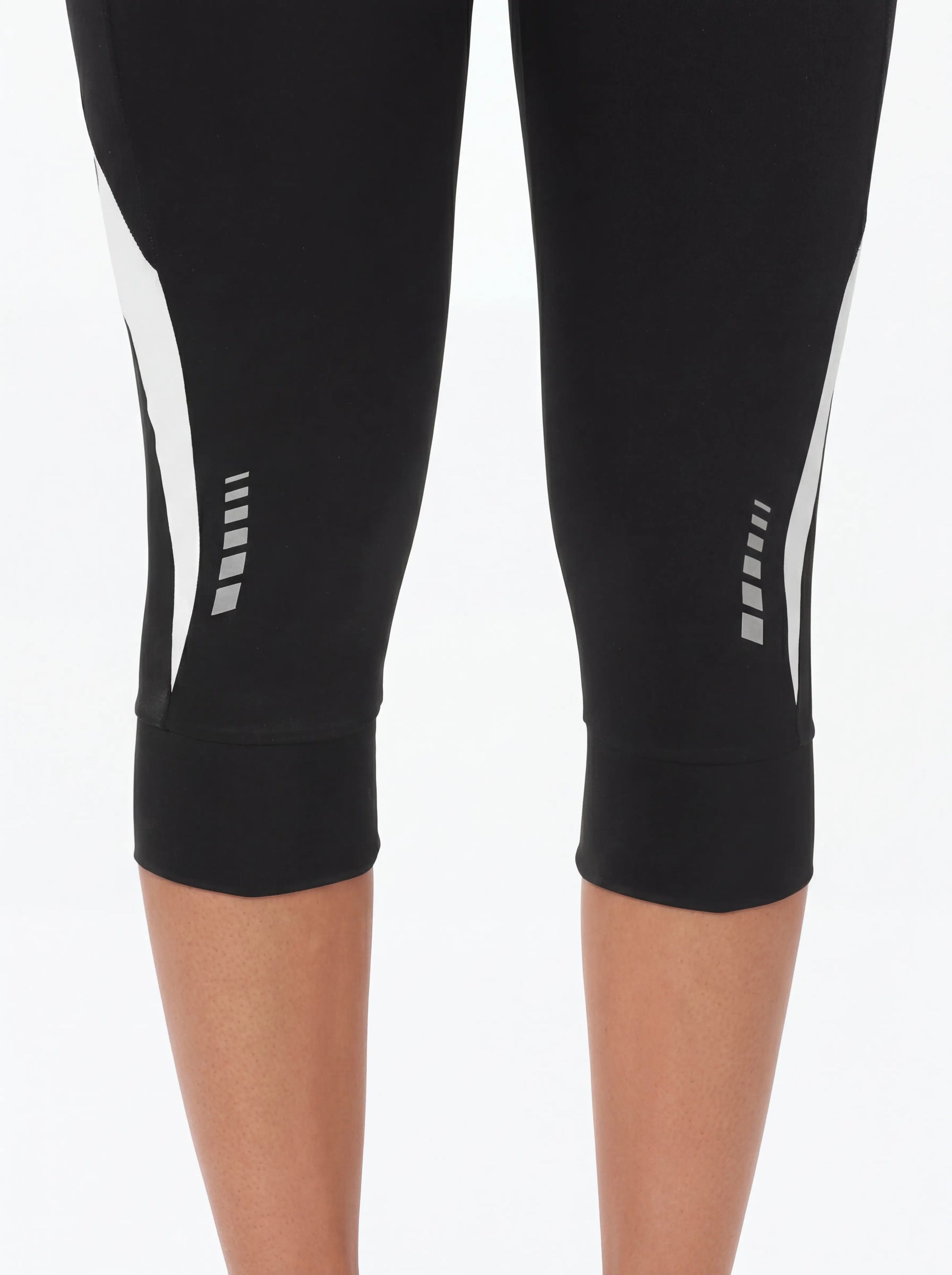 QUALICOS Women's Cycling Capri Pants with Pockets close-up reflective leg details for low-light rides