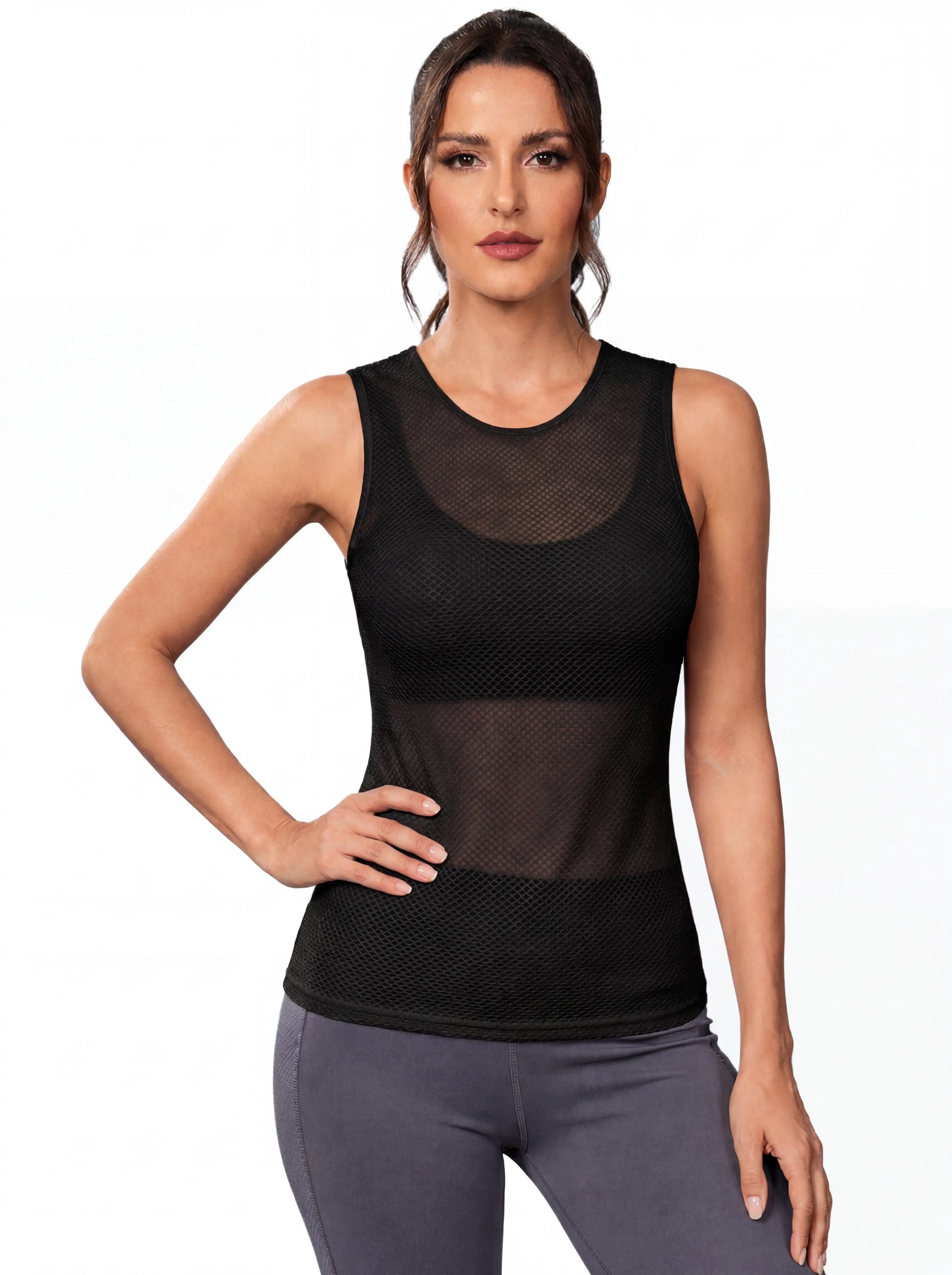 QUALICOS Women's Mesh Cycling Base Layer black sleeveless mesh vest on model with breathable fitted design